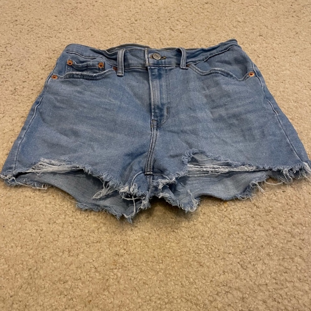 Levi’s high-rise distress denim shorts